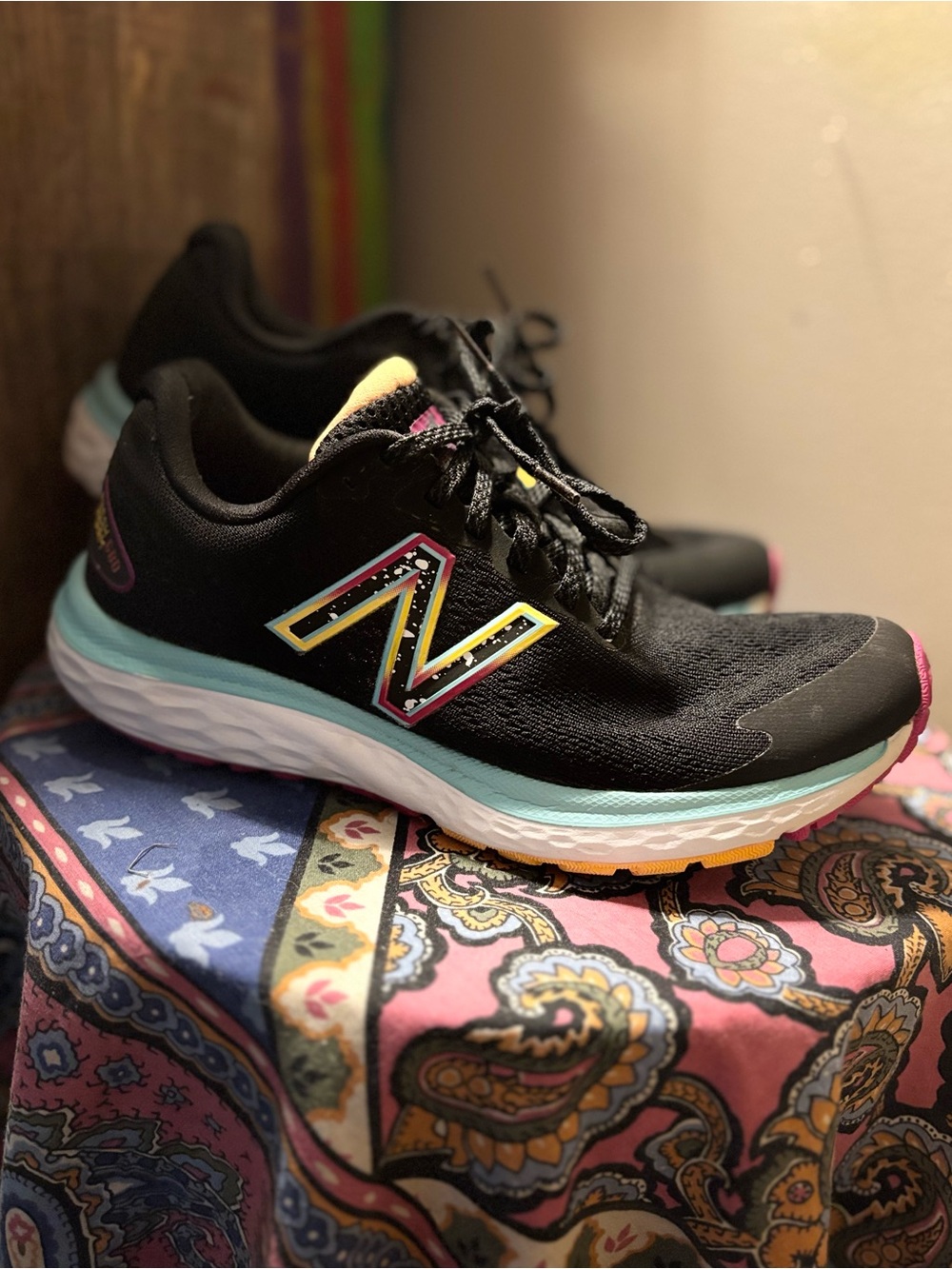 New Balance women’s ' Black Running Shoes with colorful Accent